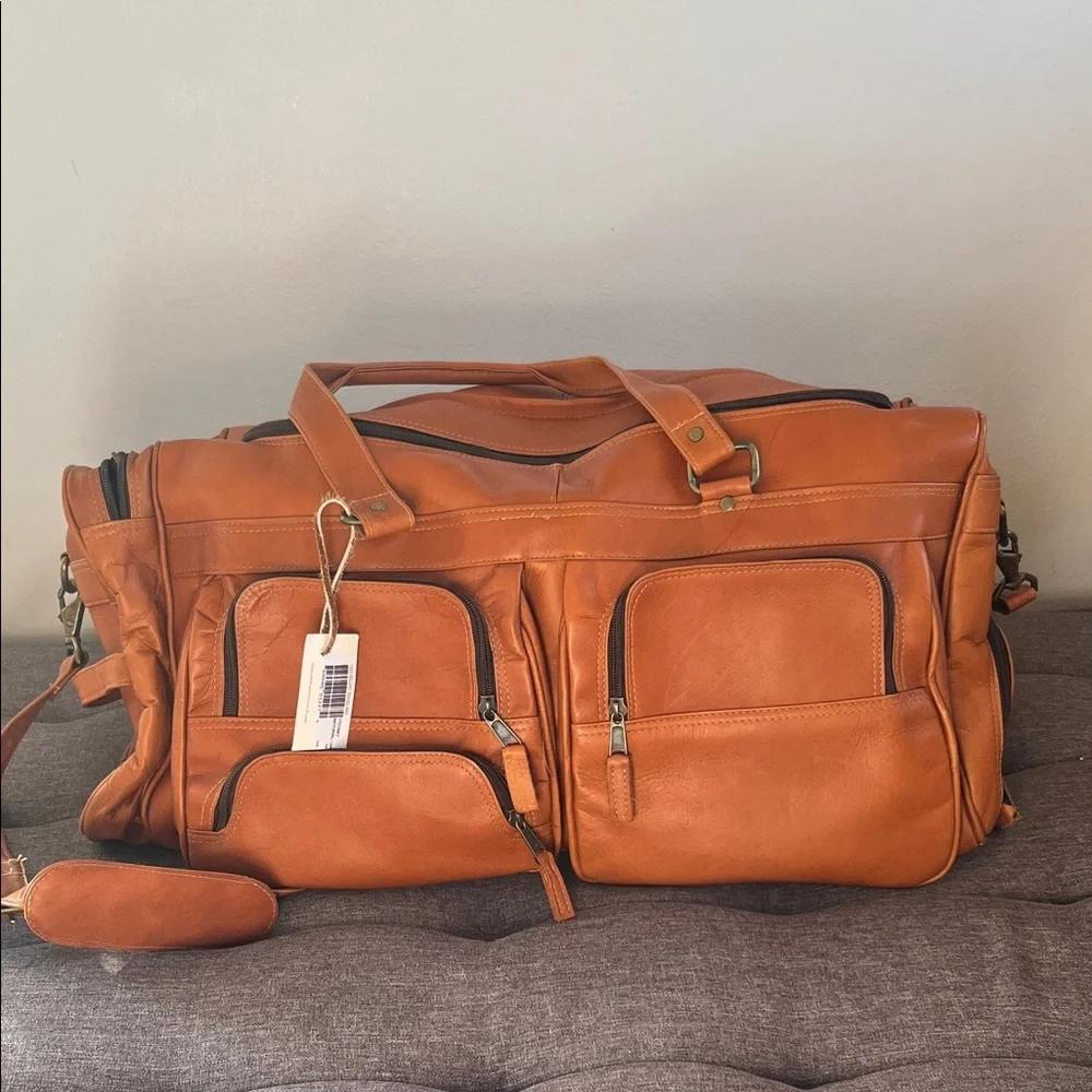 Latico Leather Deluxe leather Travel Bag New with tags